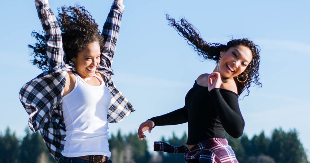 choosing joy jumping women